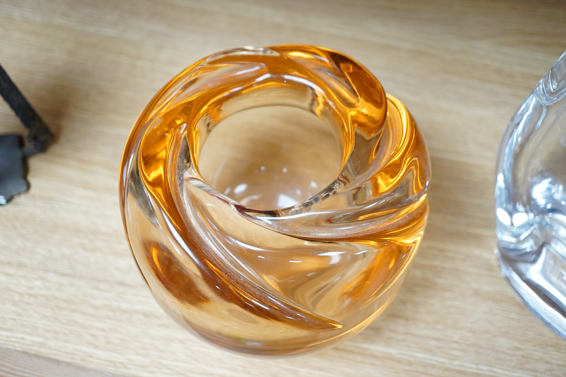 A Daum Nancy orange glass vase and a statue of an owl, largest 24cm high